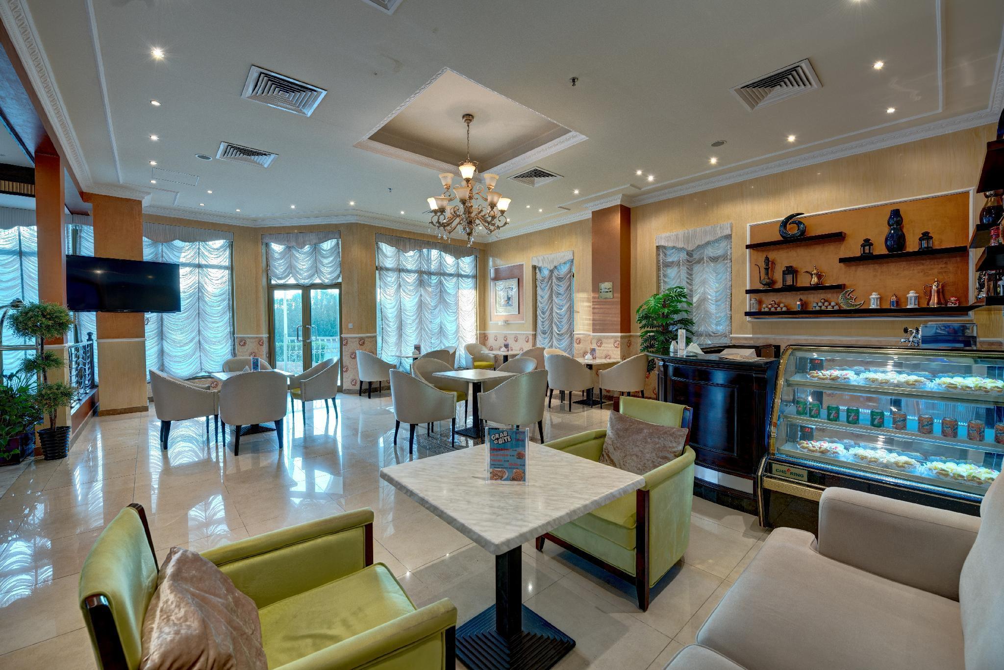 Sahara Beach Resort&Spa Schardscha Exterior foto The lobby lounge at the hotel