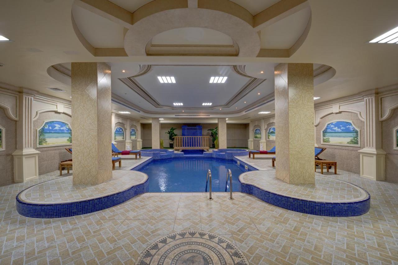 Sahara Beach Resort&Spa Schardscha Exterior foto The pool at the spa
